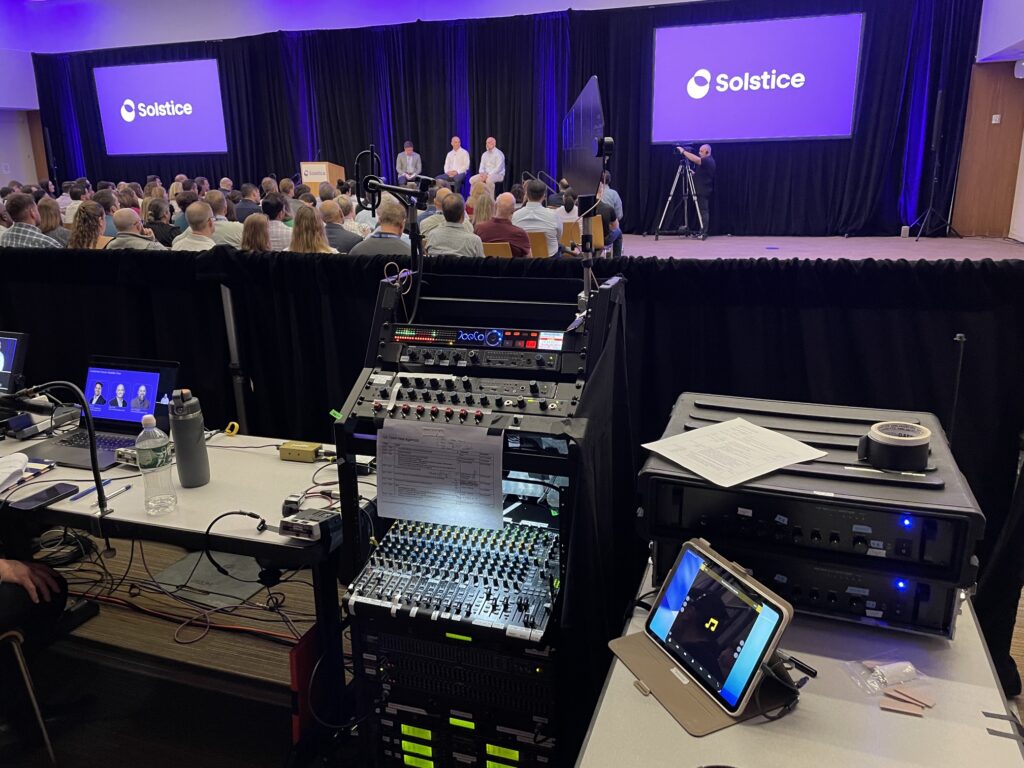 NY NJ Sound's sound mixing and recording equipment in use at a hybrid corporate meeting